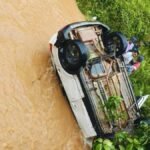 car falls into hemavathi river due to rain