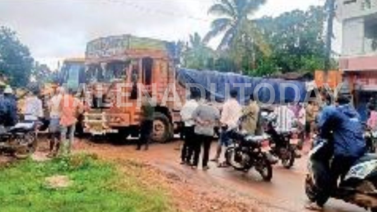 Cement Lorry Stuck in Mud Causes Traffic Jam on Anandapura Highway