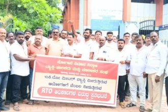 Sogane Airport Taxi Owners Association protests against auto drivers illegally picking up passengers inside the airport premises, violating the 10 km rule. They warn of severe agitation if RTO fails to take action.