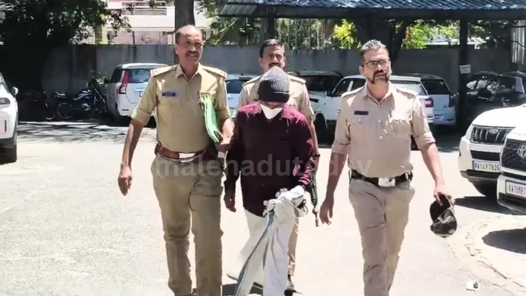 Police escorting a detained individual.